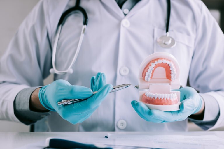 What are the key things to consider before getting permanent dentures?