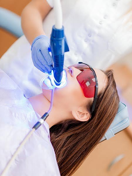 Professional cosmetic dental treatment during a smile makeover at The Port Dental Clinic