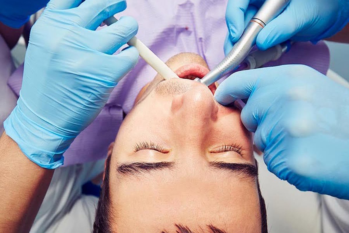 Clinician at The Port Dental Clinic in Calgary NE, where restorative treatment is carried out